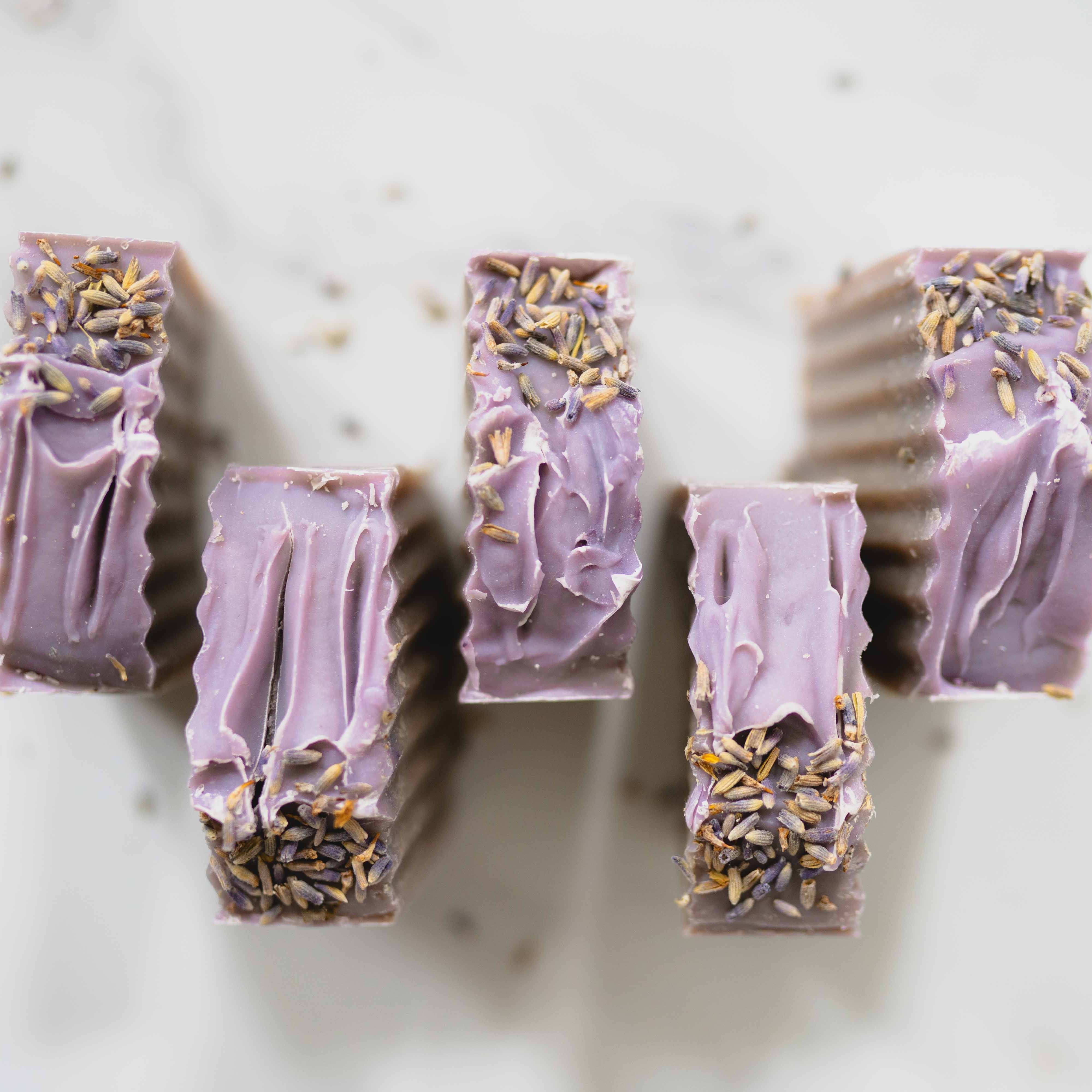 Lavender chocolate bars with sprinkles on a light background