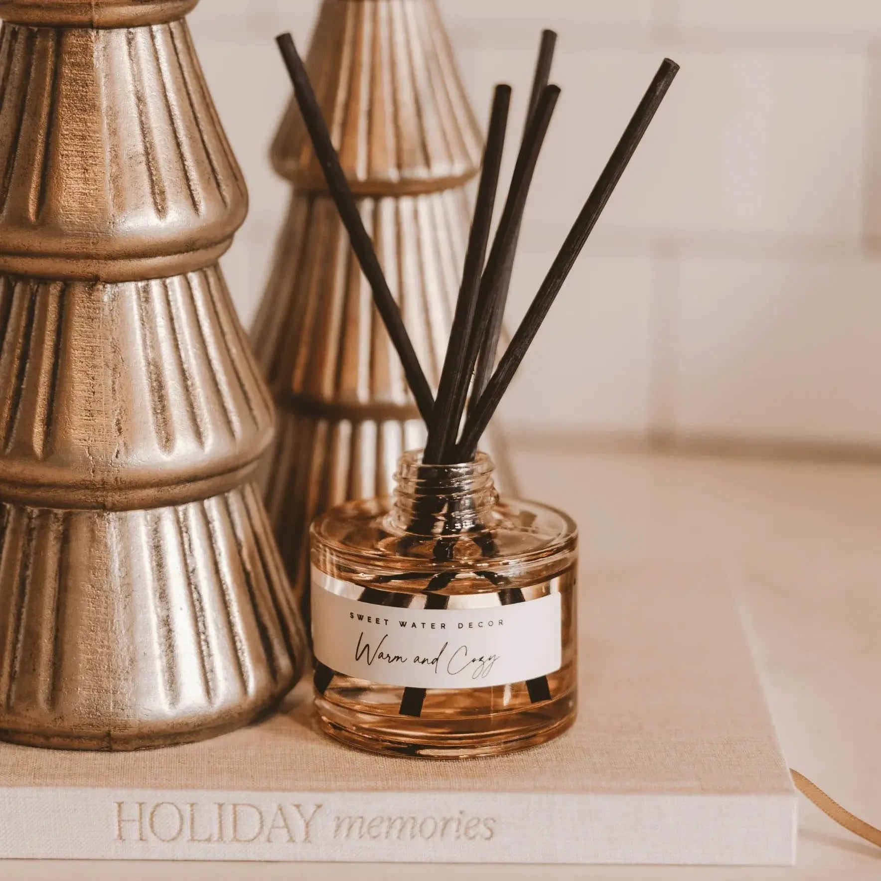 Warm and Cozy reed diffuser with gold decor, perfect for farmhouse or cottage style home ambiance