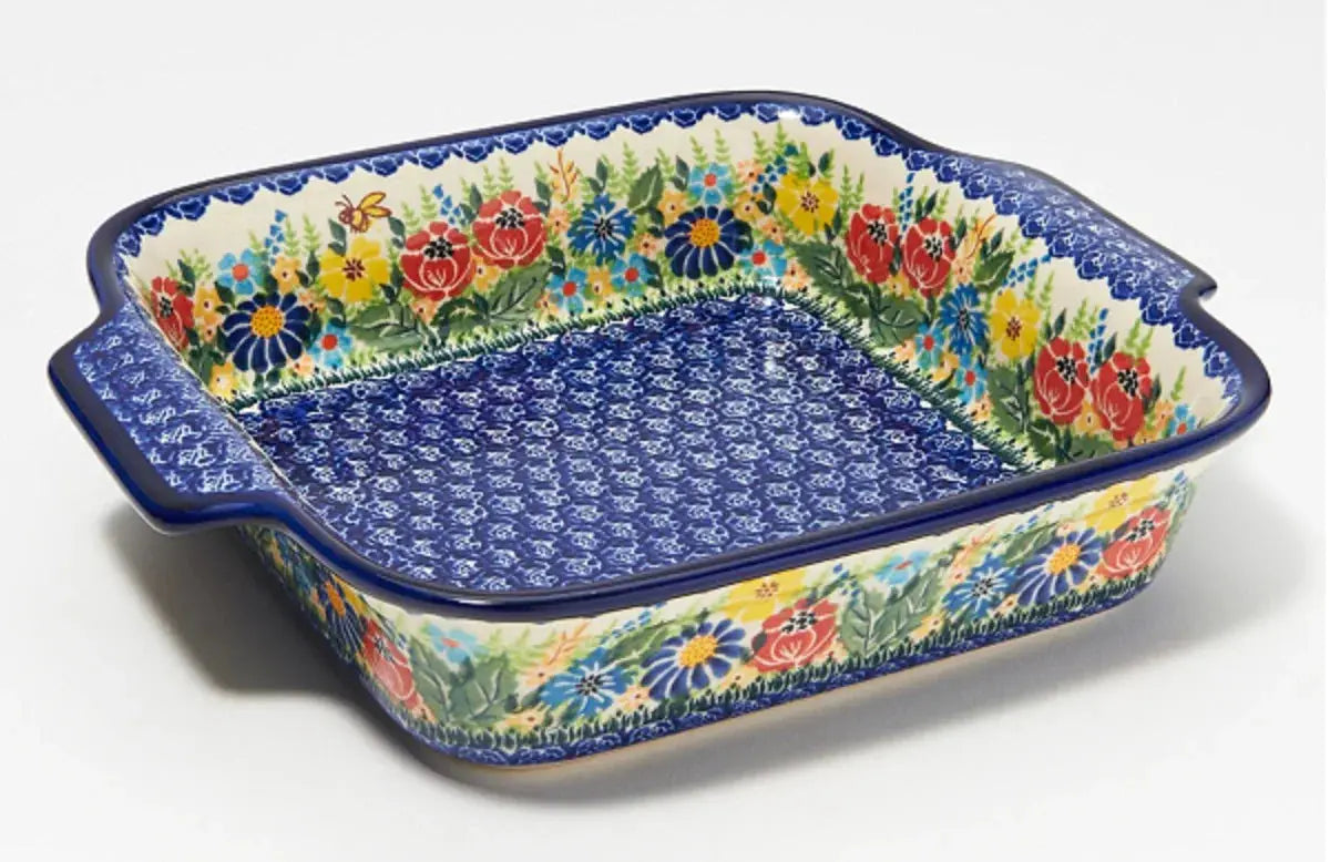 Colorful floral ceramic baking dish with blue patterned interior, farmhouse kitchen decor