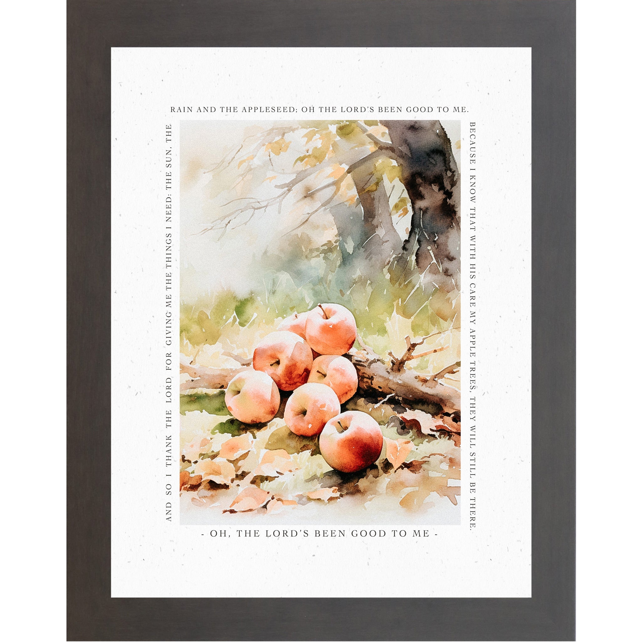 Framed artwork with apples and nature-themed text on a white background