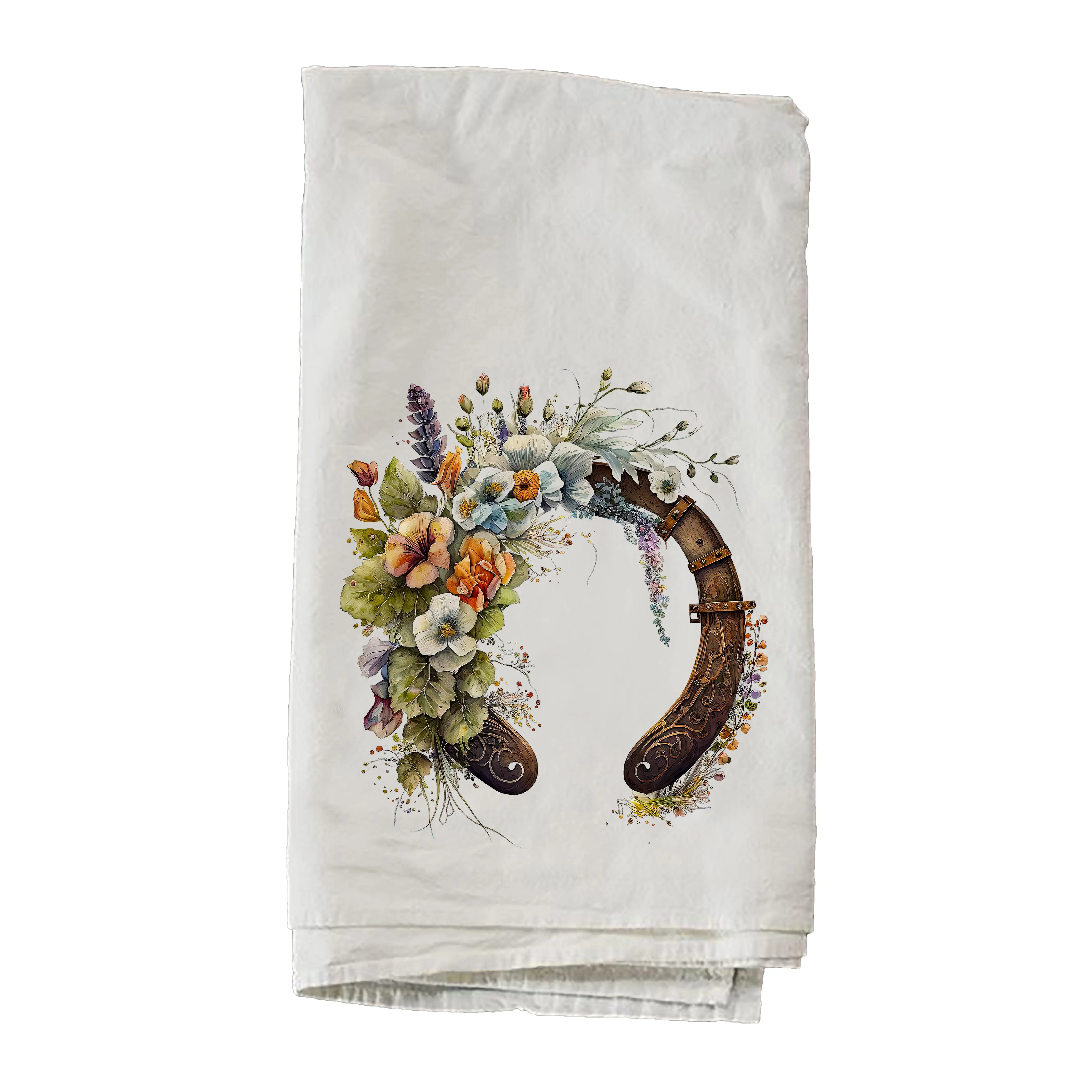 Floral design on a white towel with a horseshoe