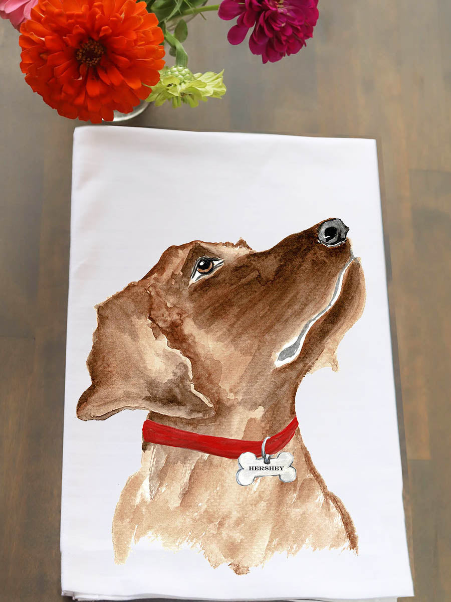 Towel with a dog illustration and flowers on a wooden surface
