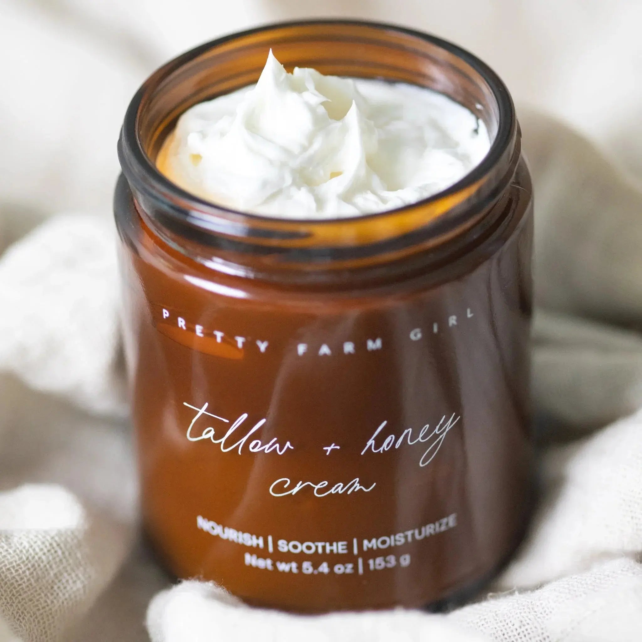 Tallow + honey cream in amber jar, nourish soothe moisturize, cozy farmhouse bath essential