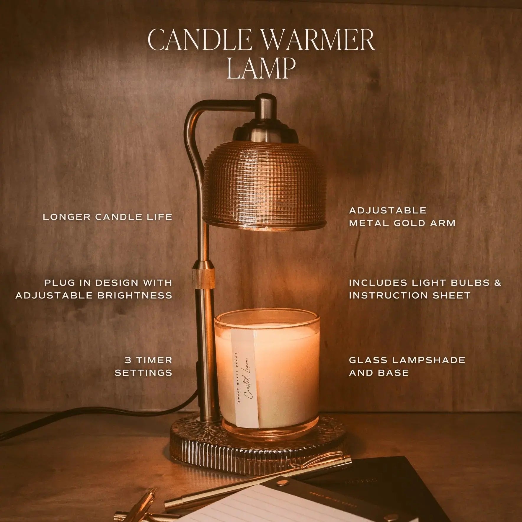 Candle warmer lamp with adjustable gold arm, glass shade, and timer settings for cozy home decor