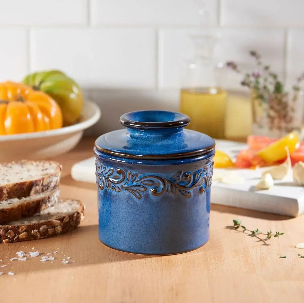 Blue ceramic kitchen canister with leaf design, farmhouse decor for cozy home