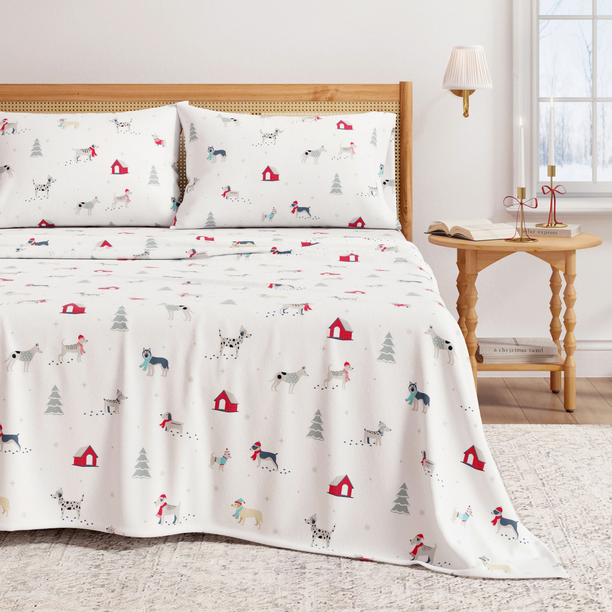 Bedding set with animal pattern on a bed in a room with a lamp and table.