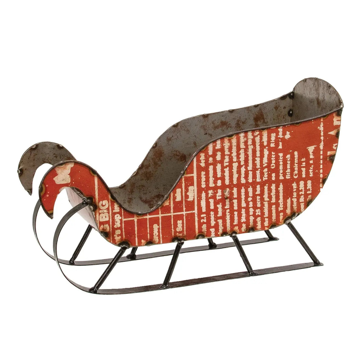 A vintage-style metal sled decorative piece with a distressed red and white printed body and dark rusted metal trim, shown on a plain white background.