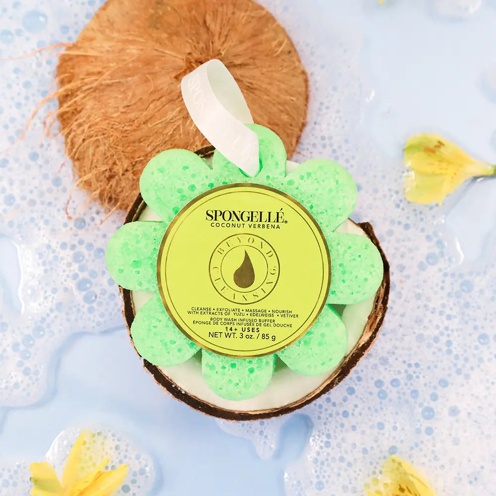 Green flower-shaped sponge with a yellow label on a blue background