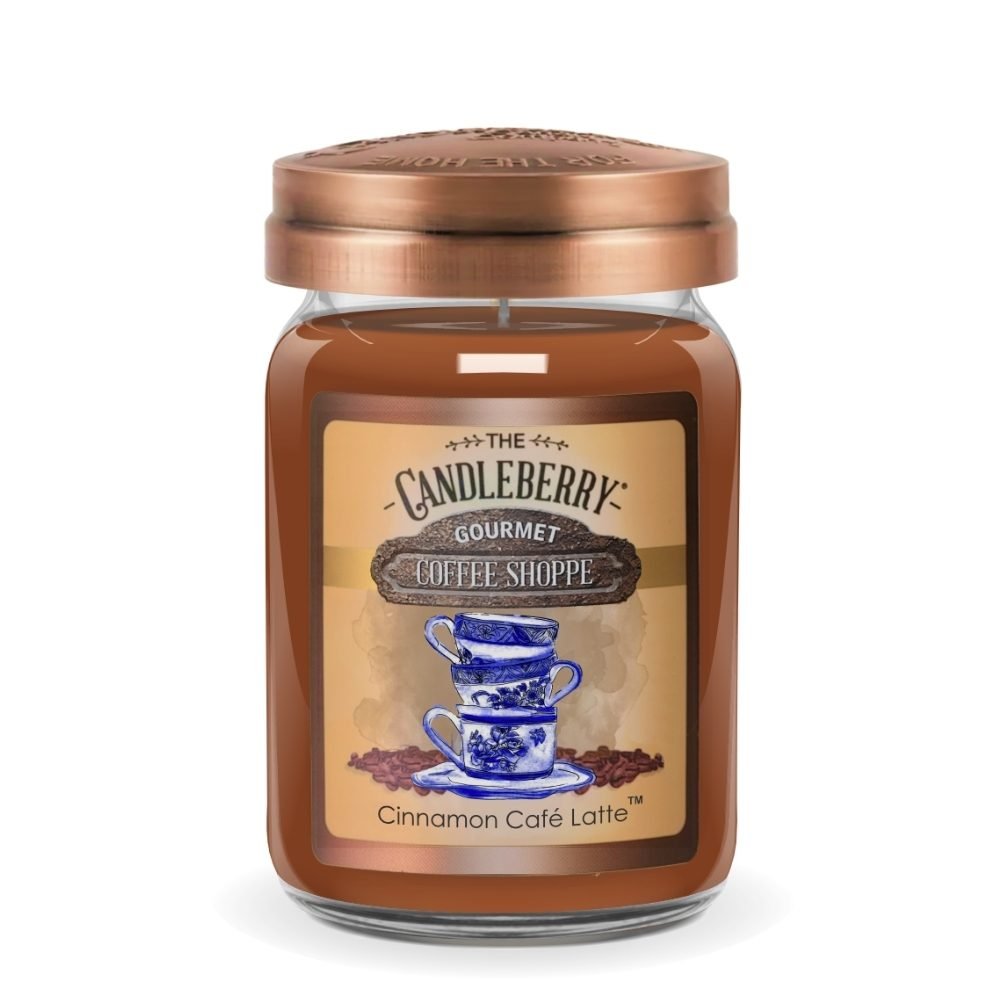 A glass jar candle with a copper-toned metal lid, filled with a warm brown wax. The front label reads 'The Candleberry Gourmet Coffee Shoppe' and 'Cinnamon Café Latte,' with an illustration of blue-and-white coffee cups on a tan background.