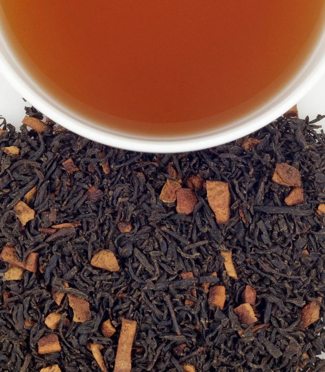 Cozy farmhouse-style black tea with cinnamon pieces, perfect for warm, peaceful moments