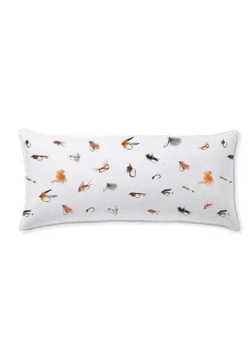 White decorative pillow with colorful fly fishing lure print, cozy farmhouse decor accent