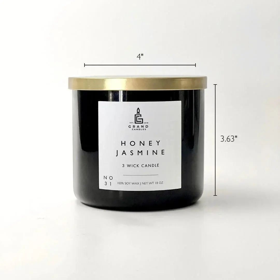 Honey Jasmine 3-wick soy candle in black jar with gold lid, cozy home decor