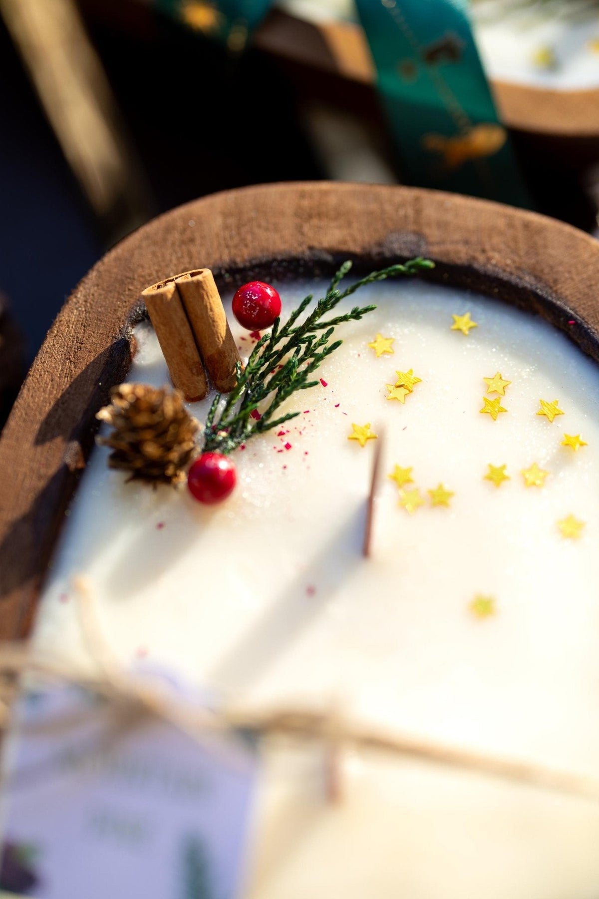 Close-up of a dessert with decorative elements on a wooden plate