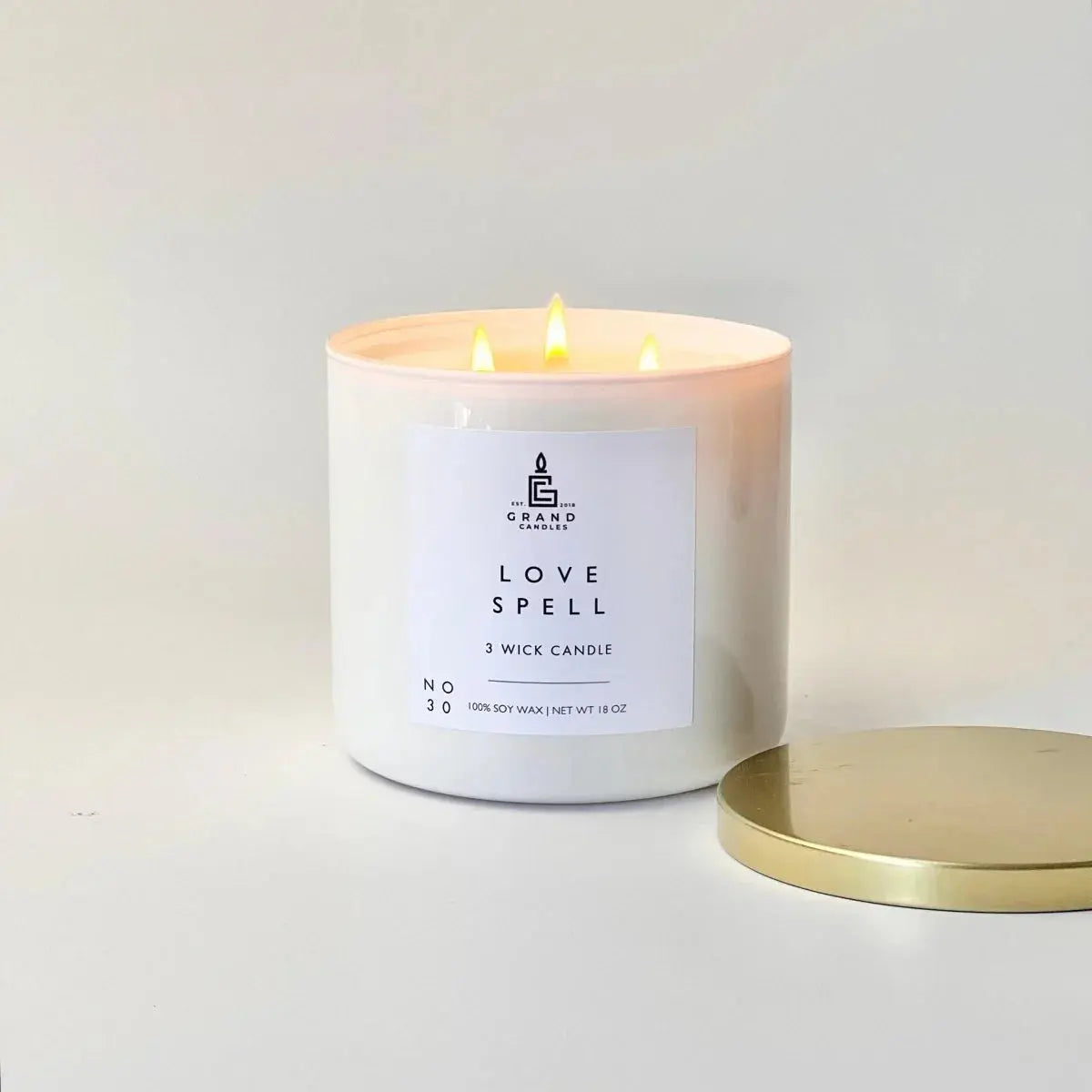 Love Spell 3-wick soy candle with gold lid, cozy home decor for farmhouse style living spaces