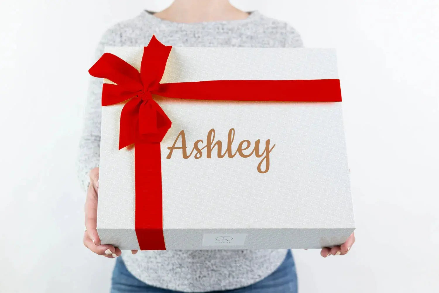Personalized gift box with red bow, name Ashley, cozy home decor gift idea