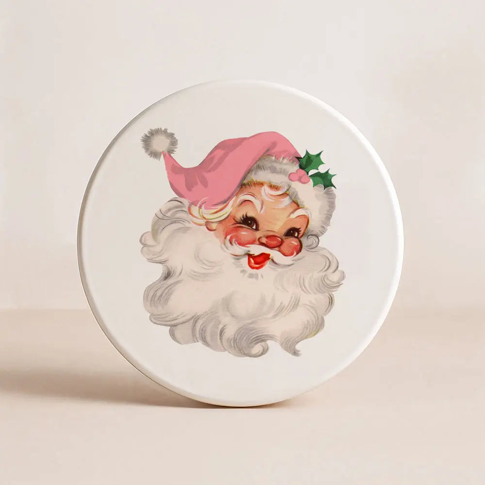 Round ceramic plate with a vintage-style illustration of a gnome on a beige background