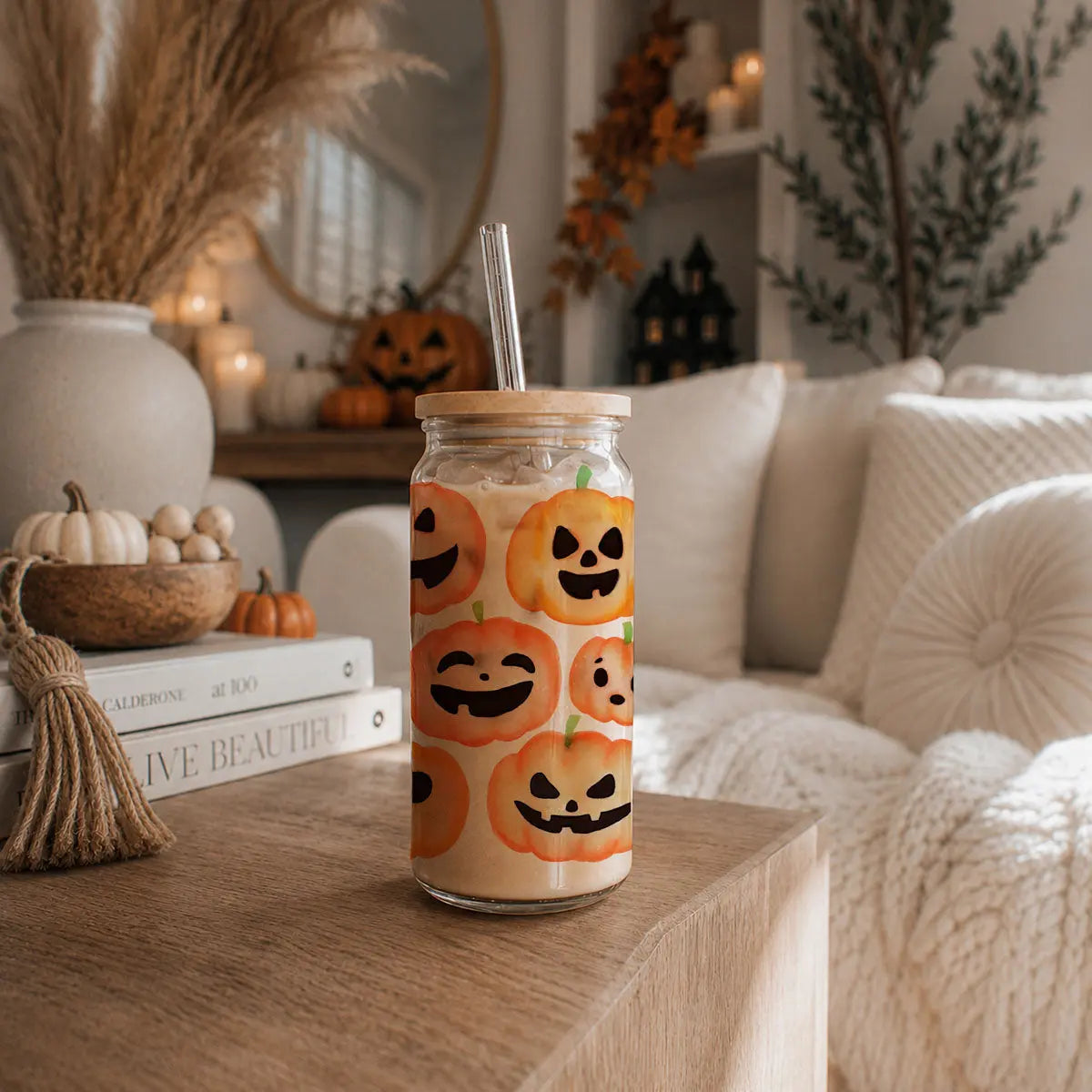 Jar with Halloween-themed design on a wooden table in a cozy living room.