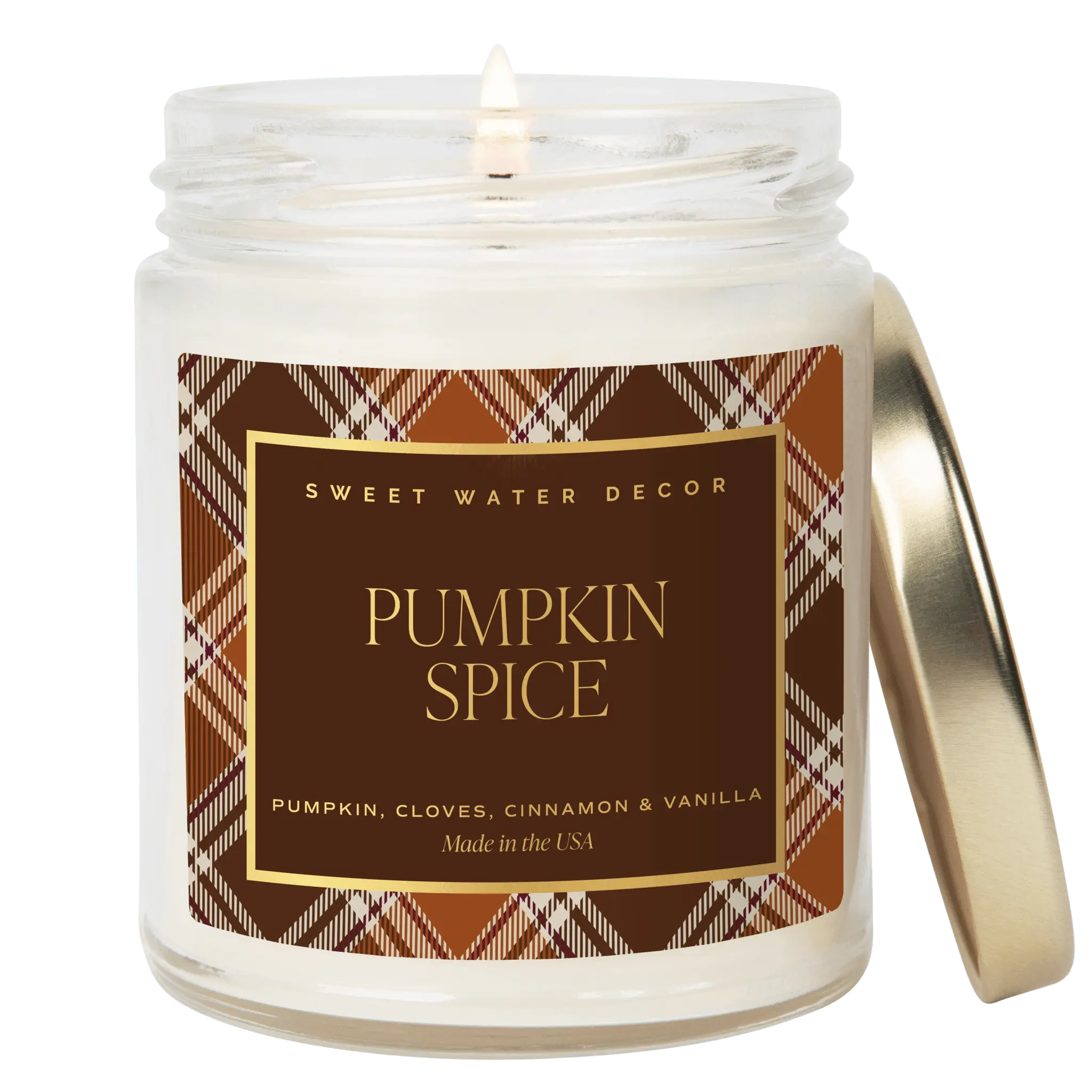 Candle in a jar with a 'Pumpkin Spice' label on a dark background