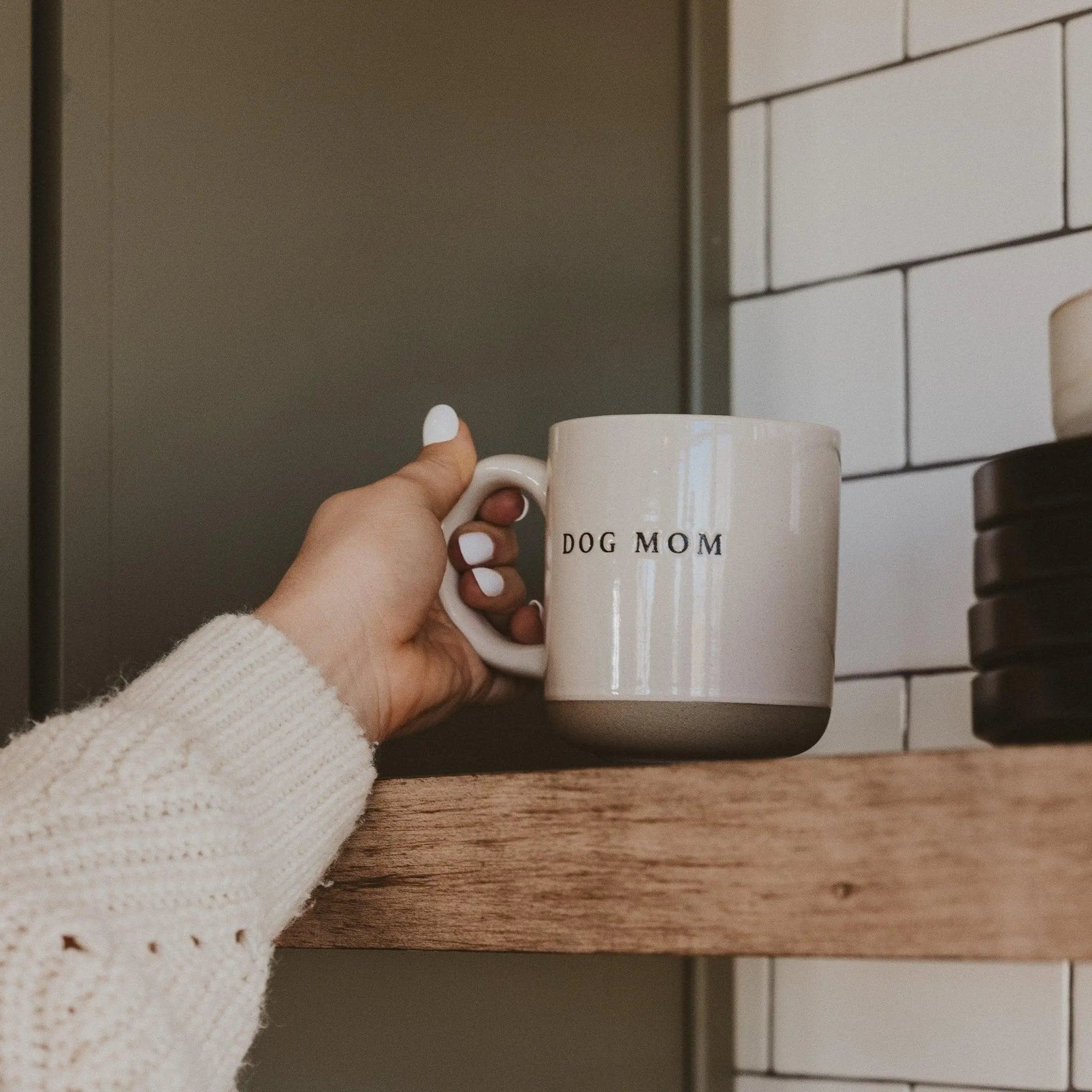 Dog Mom ceramic mug held in cozy sweater, farmhouse kitchen decor