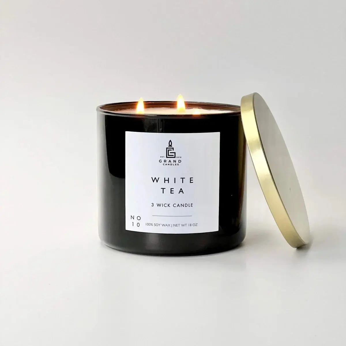 White Tea 3-wick soy candle in black jar with gold lid, cozy home decor