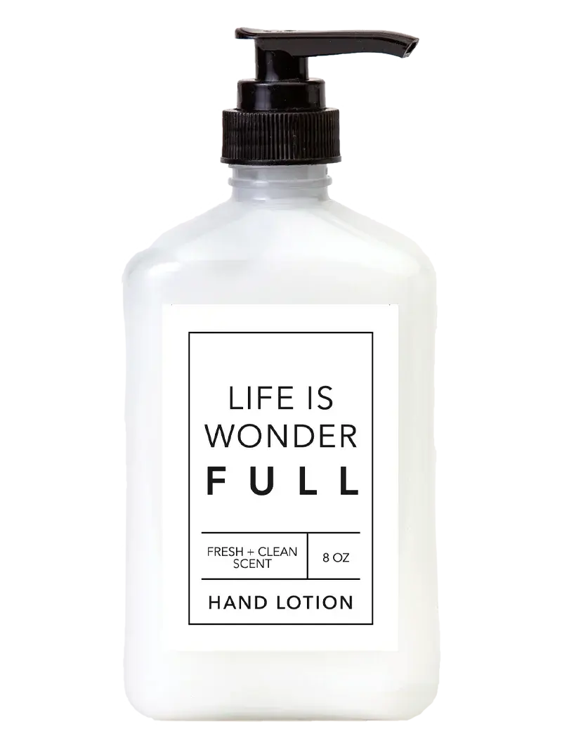 White hand lotion bottle with black pump, 'Life is Wonderful' label, fresh clean scent, 8 oz